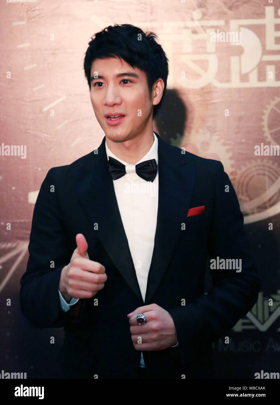 Taiwan-based American singer Leehom Wang poses during the 2015 QQ Music ...