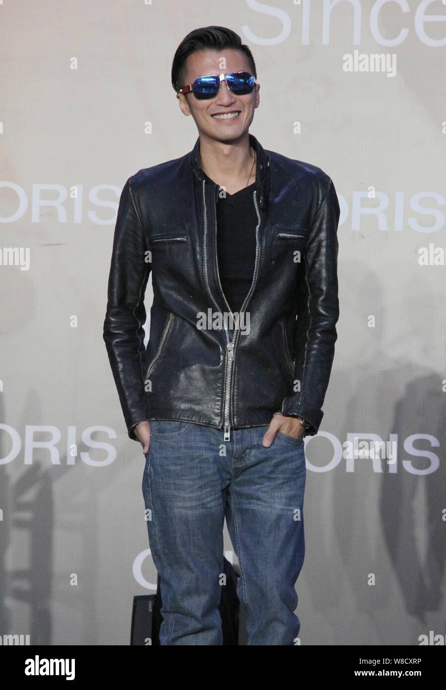 Hong Kong singer and actor Nicholas Tse smiles at a promotional event