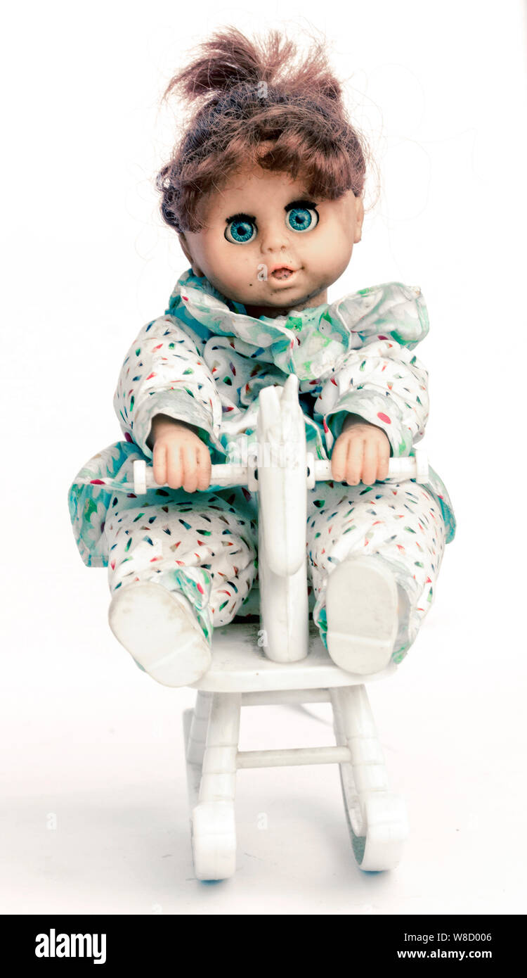 animated demon doll on rocking horse