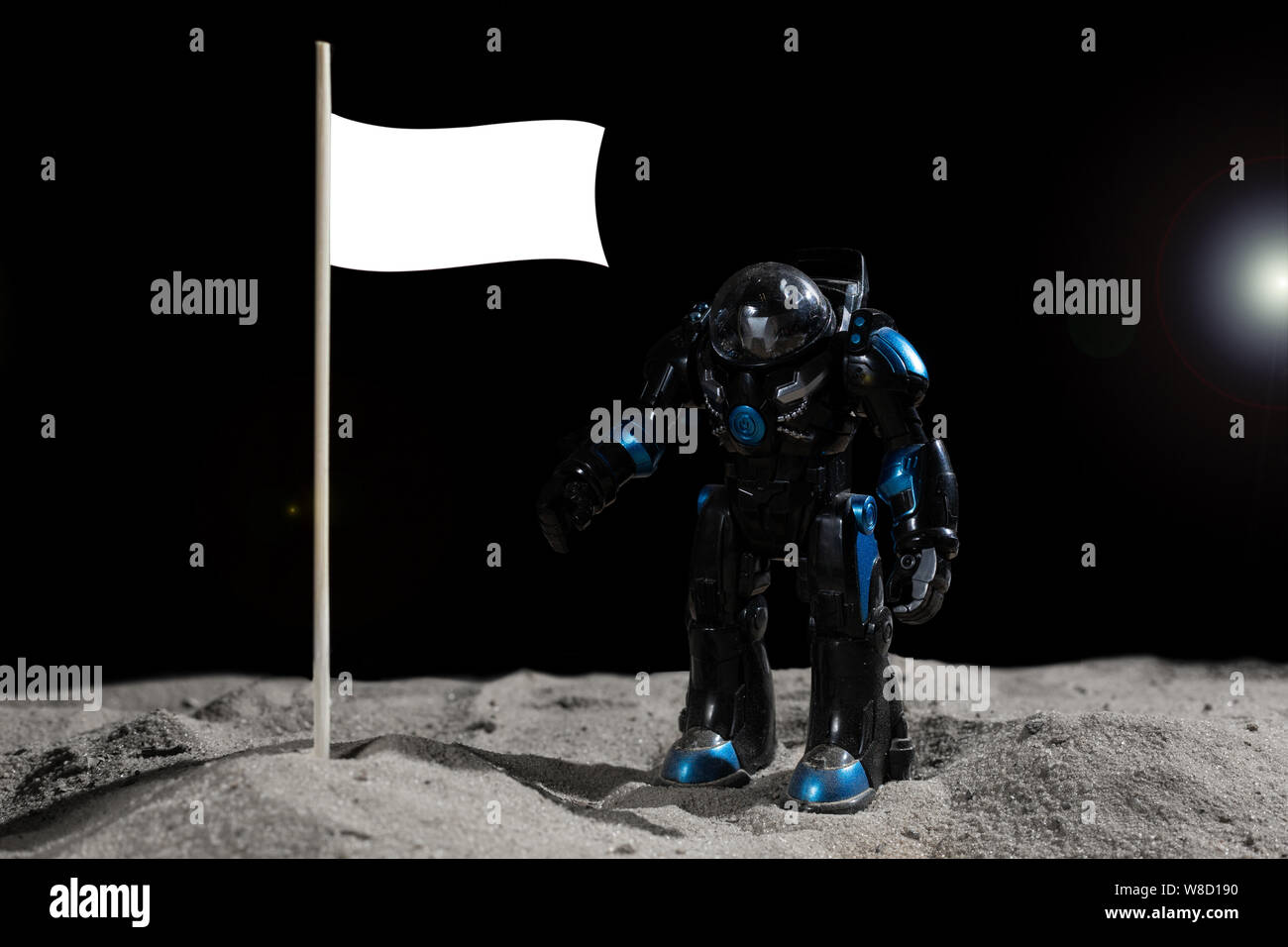Mokup: Robotic astroneer in black space suit put a american flag into the surface of the planet in outer space at the rim light of star Stock Photo
