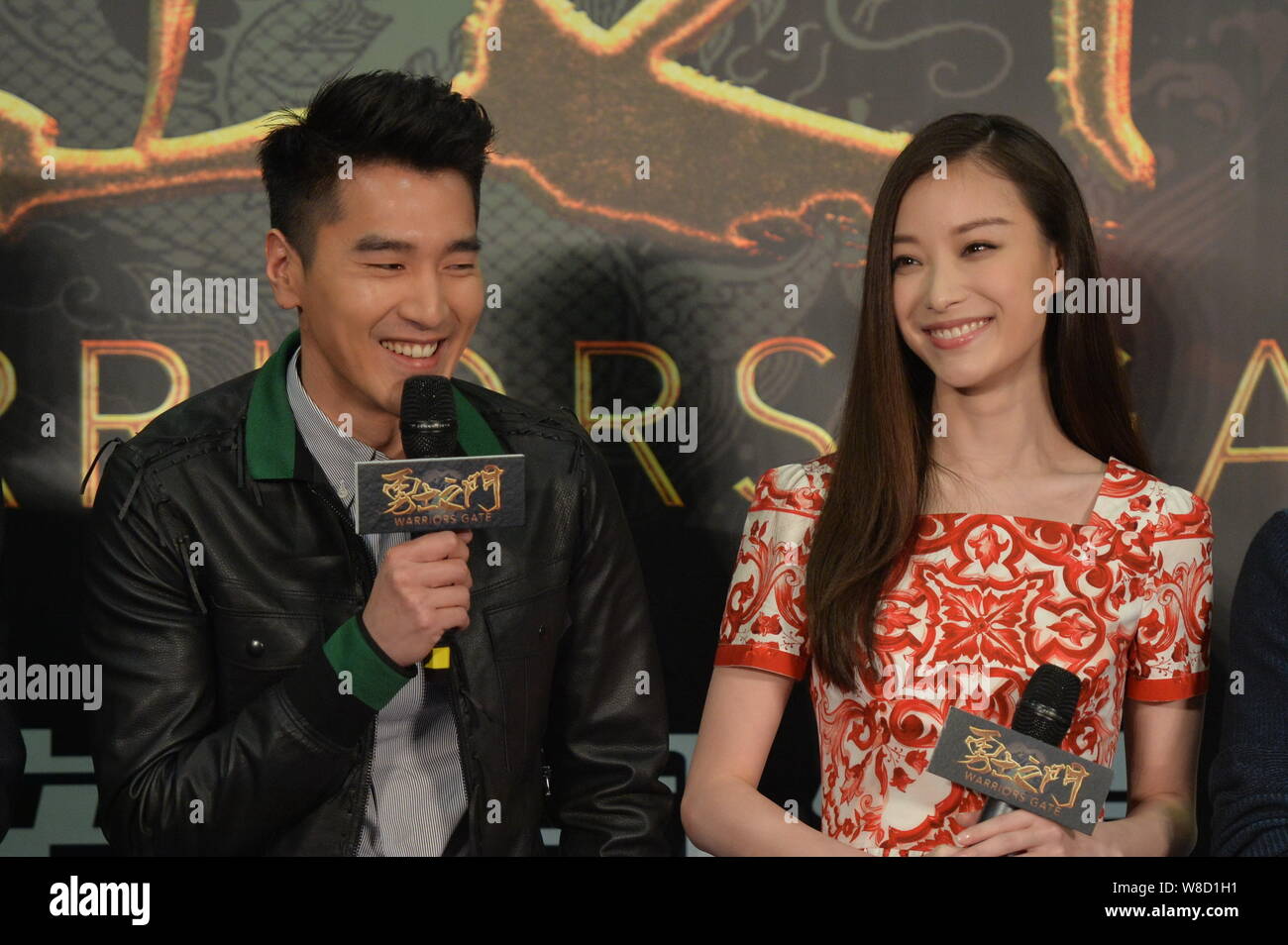 Chinese actress Ni Ni, right, smiles as Taiwanese actor Mark Zhao