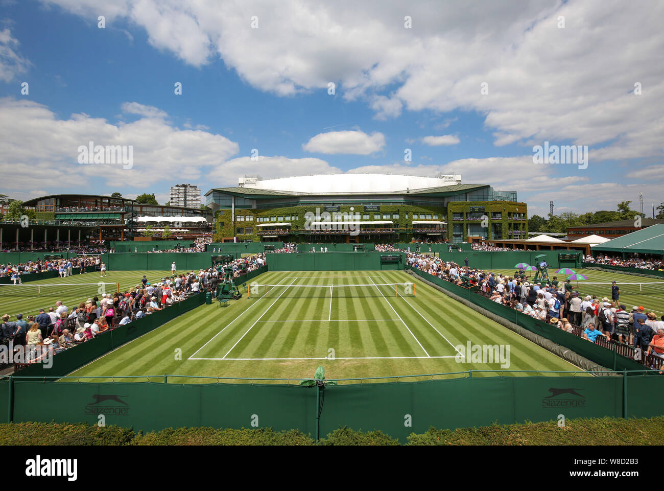 Panoramic view of outside courts with Centre Court building in the background, 2019 Wimbledon Championships, London, England, United Kingdom Stock Photo