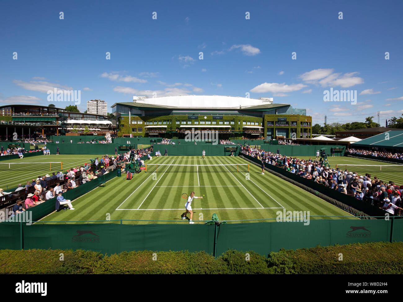 Panoramic view of outside courts with Centre Court building in the background, 2019 Wimbledon Championships, London, England, United Kingdom. Stock Photo