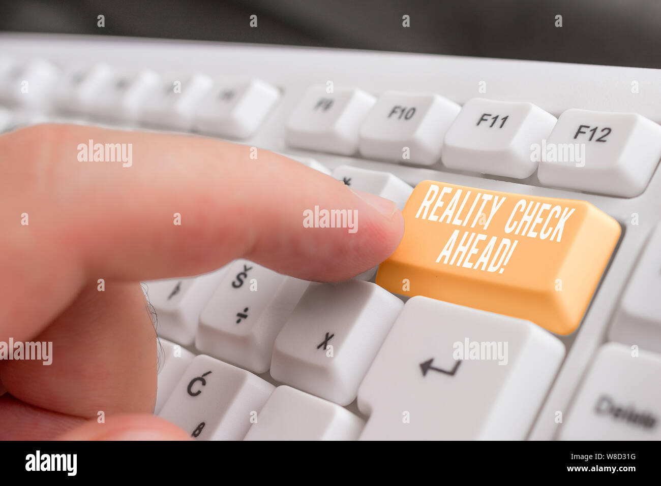 Word writing text Reality Check Ahead. Business photo showcasing makes them recognize truth about situations or difficulties White pc keyboard with em Stock Photo