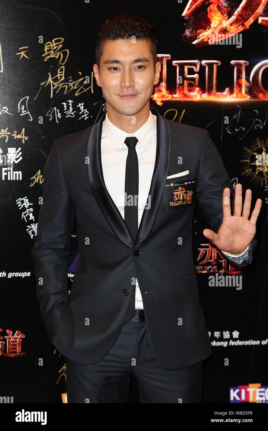 South Korean actor Choi Siwon waves at the premiere for his new movie 'Helios' in Hong Kong, China, 28 April 2015. Stock Photo