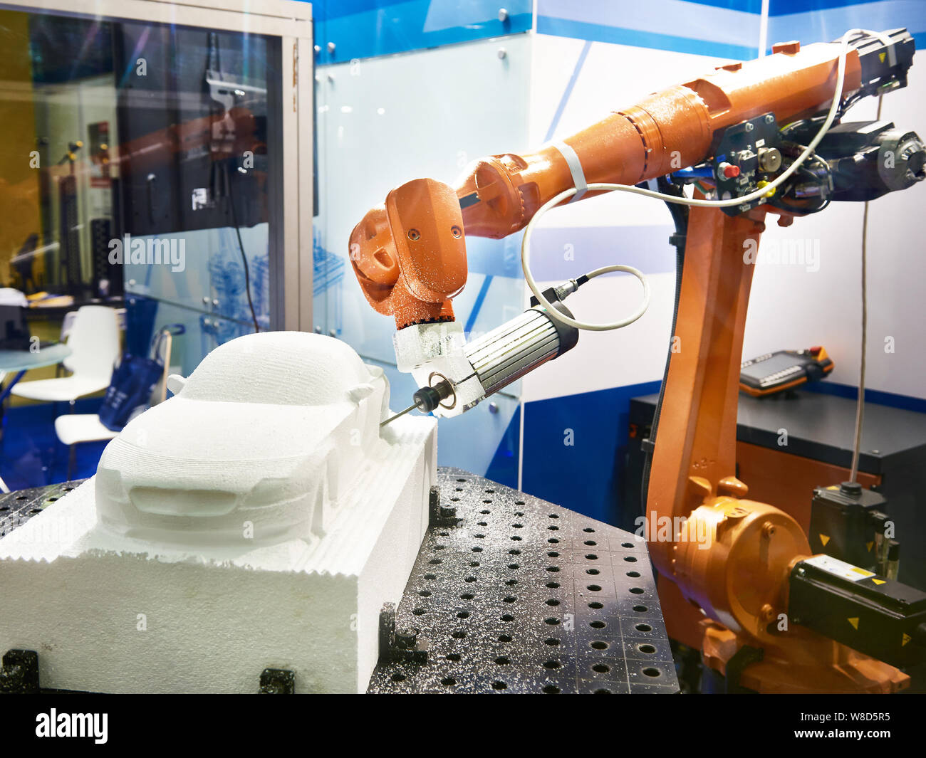 Industrial manipulator for making a plastic car model Stock Photo