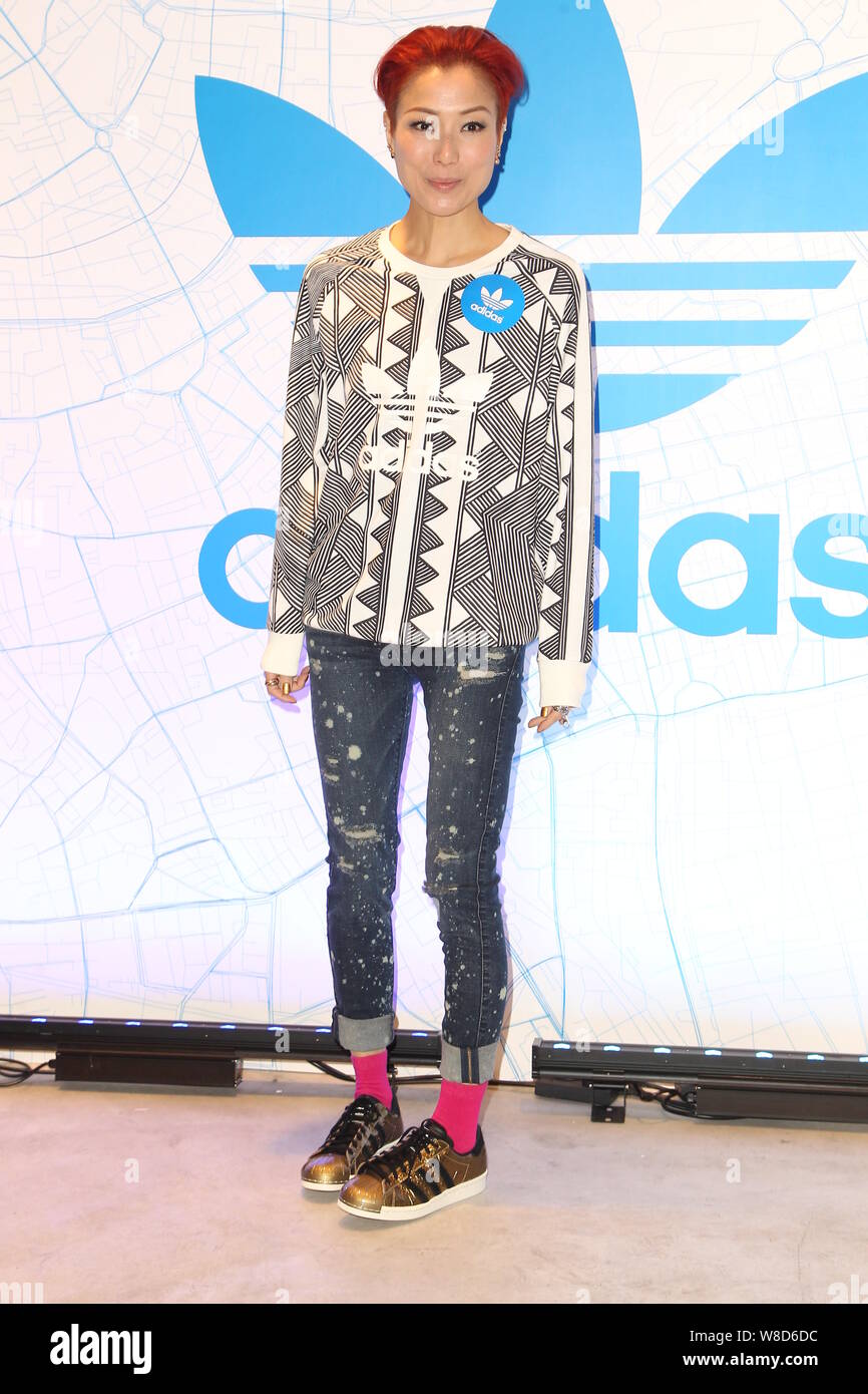 Hong Kong singer and actress Sammi Cheng poses as she arrives for an  opening party for the flagship store of Adidas Originals in Hong Kong,  China, 29 Stock Photo - Alamy