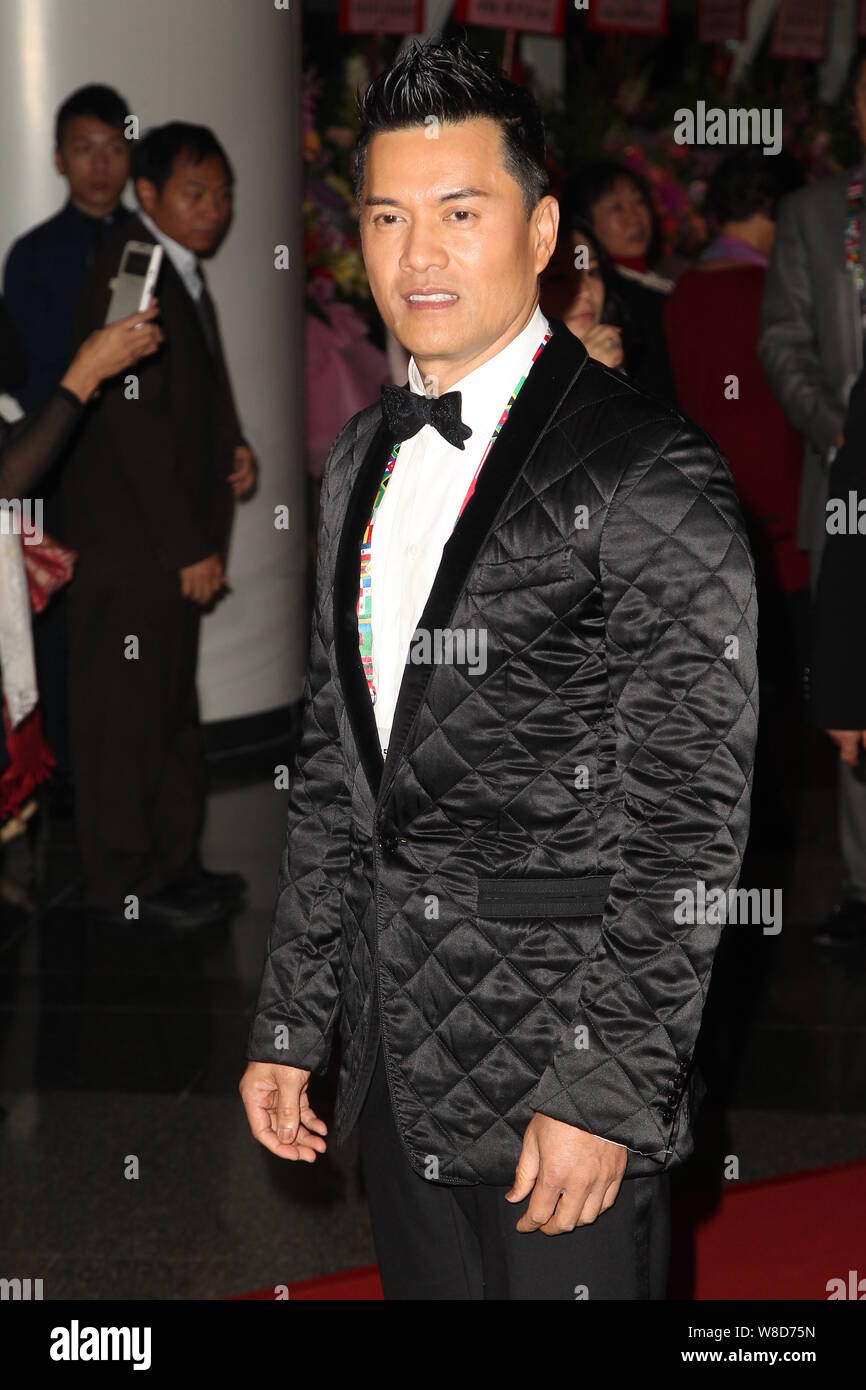 Hong Kong actor Ray Lui Leung-wai poses on the red carpet for the Inauguration Ceremony of World Trade United Foundation 2015, also the Honorary Ambas Stock Photo