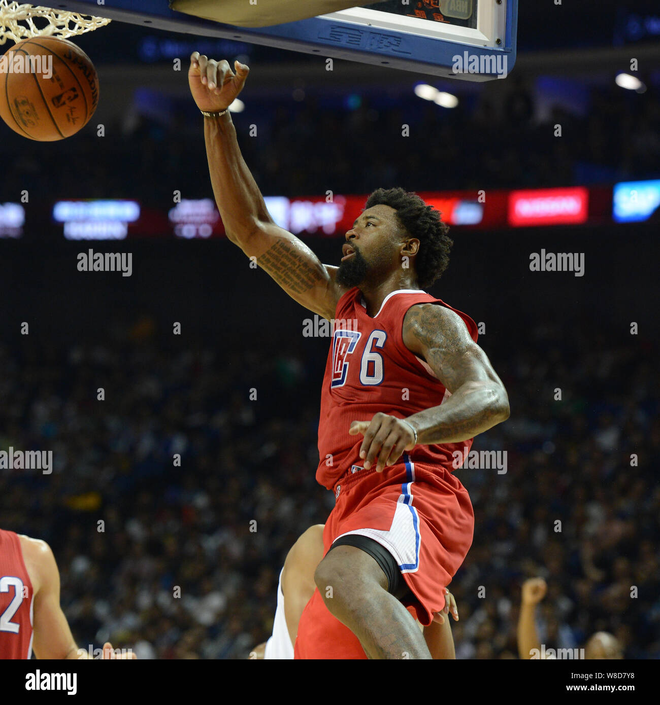 DeAndre Jordan of Los Angeles Clippers scores against Charlotte Hornets in a basketball match during the NBA Global Games in Shanghai, China, 14 Octob Stock Photo