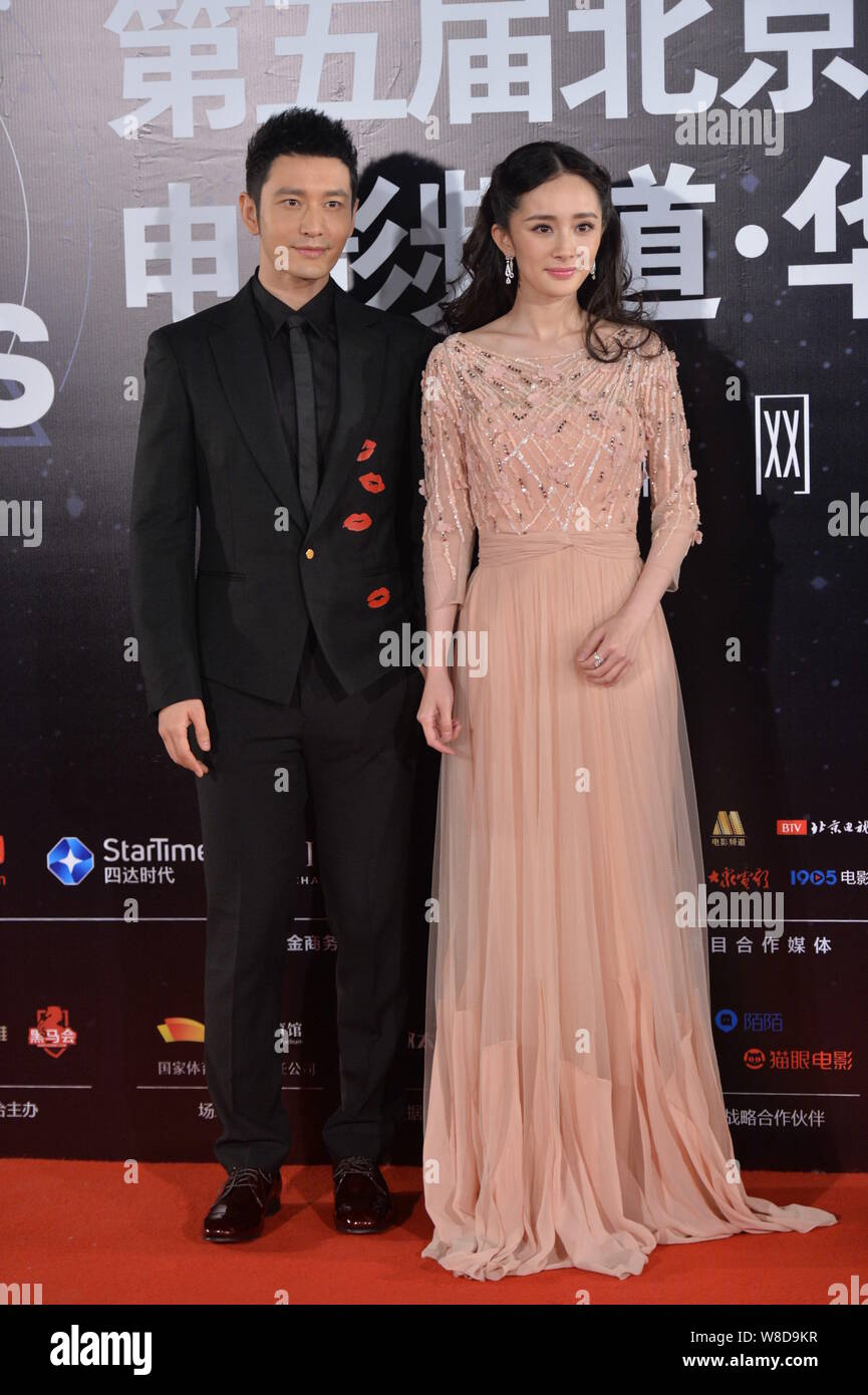Chinese actress Yang Mi, right, and actor Huang Xiaoming pose at the 2015 New Focus Night during the Fifth Beijing International Film Festival (BIFF 2 Stock Photo