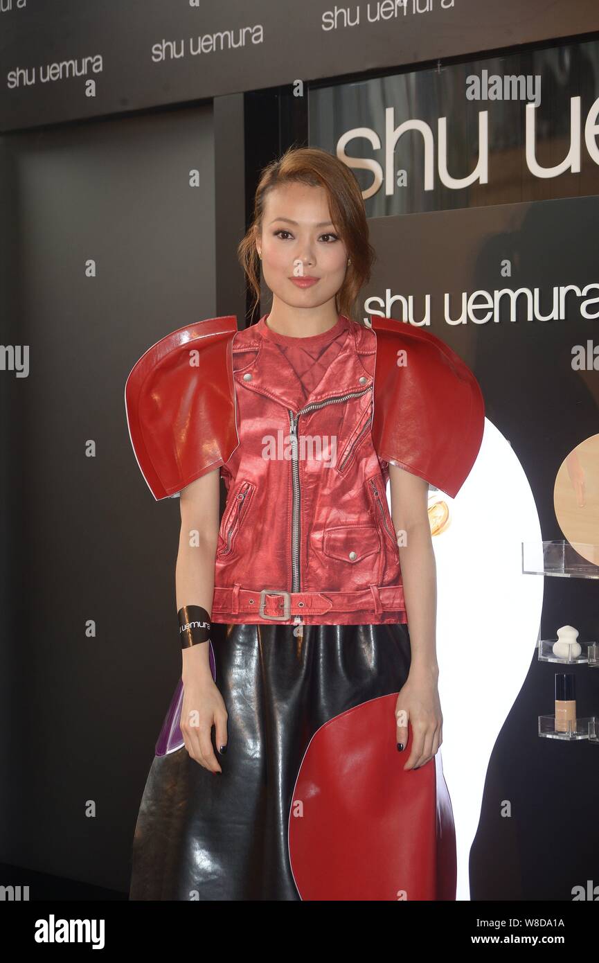 Hong Kong singer Joey Yung poses at a promotional event for Shu Uemura cosmetics in Hong Kong, China, 16 March 2015. Stock Photo