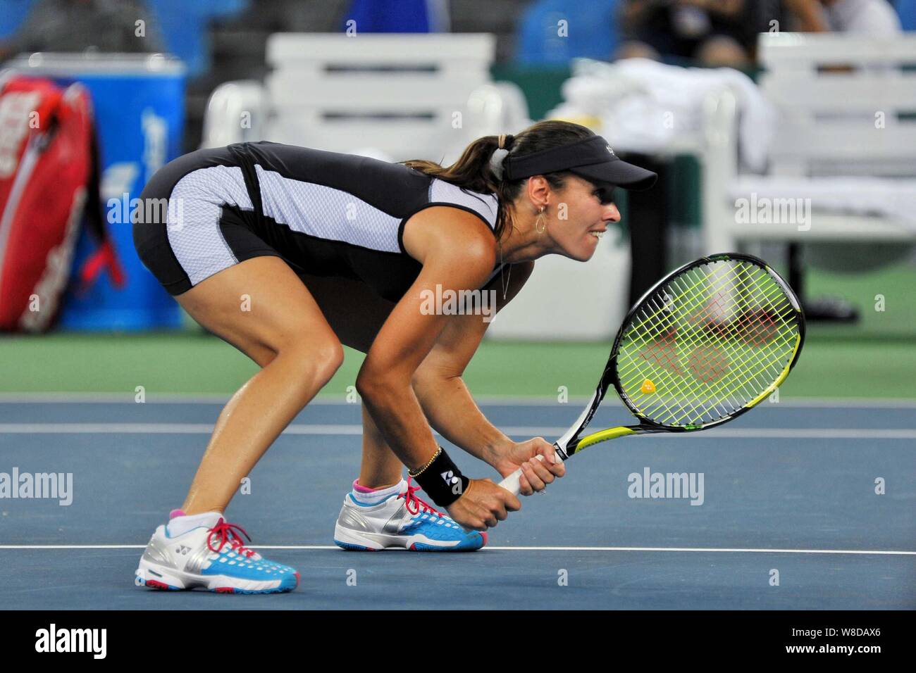 Martina Hingis of Switzerland prepares for a serve as she and Sania Mirza  of India compete against Monica Niculescu of Romania and Anna-Lena Friedsam  Stock Photo - Alamy
