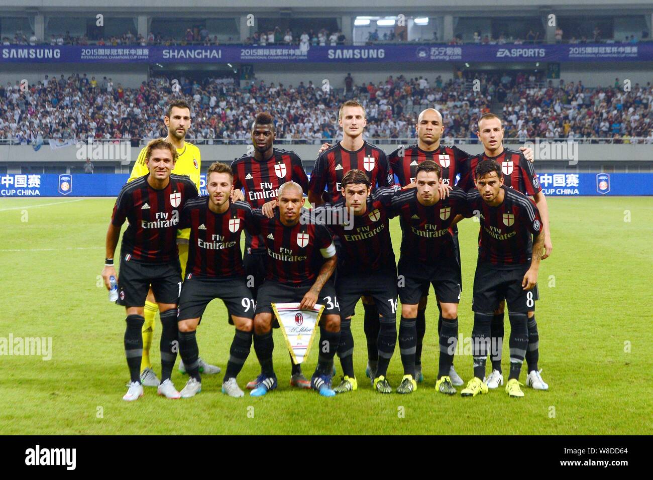 Players of the starting line-up of AC Milan pose for photos before the  Shanghai match of the International Champions Cup 2015 against Real Madrid  at t Stock Photo - Alamy