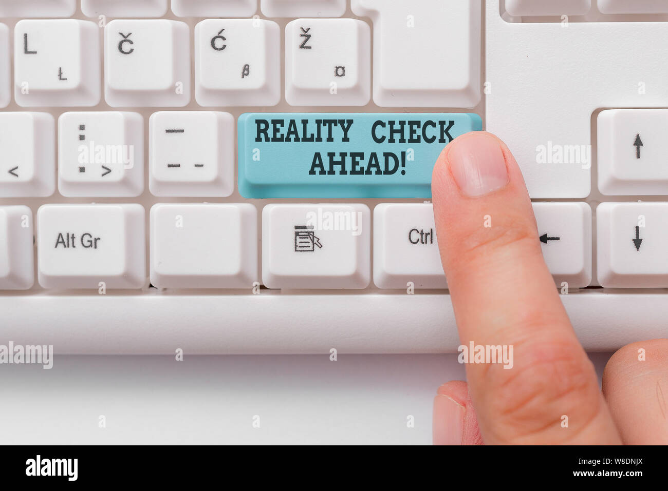 Text sign showing Reality Check Ahead. Business photo text makes them recognize truth about situations or difficulties White pc keyboard with empty no Stock Photo