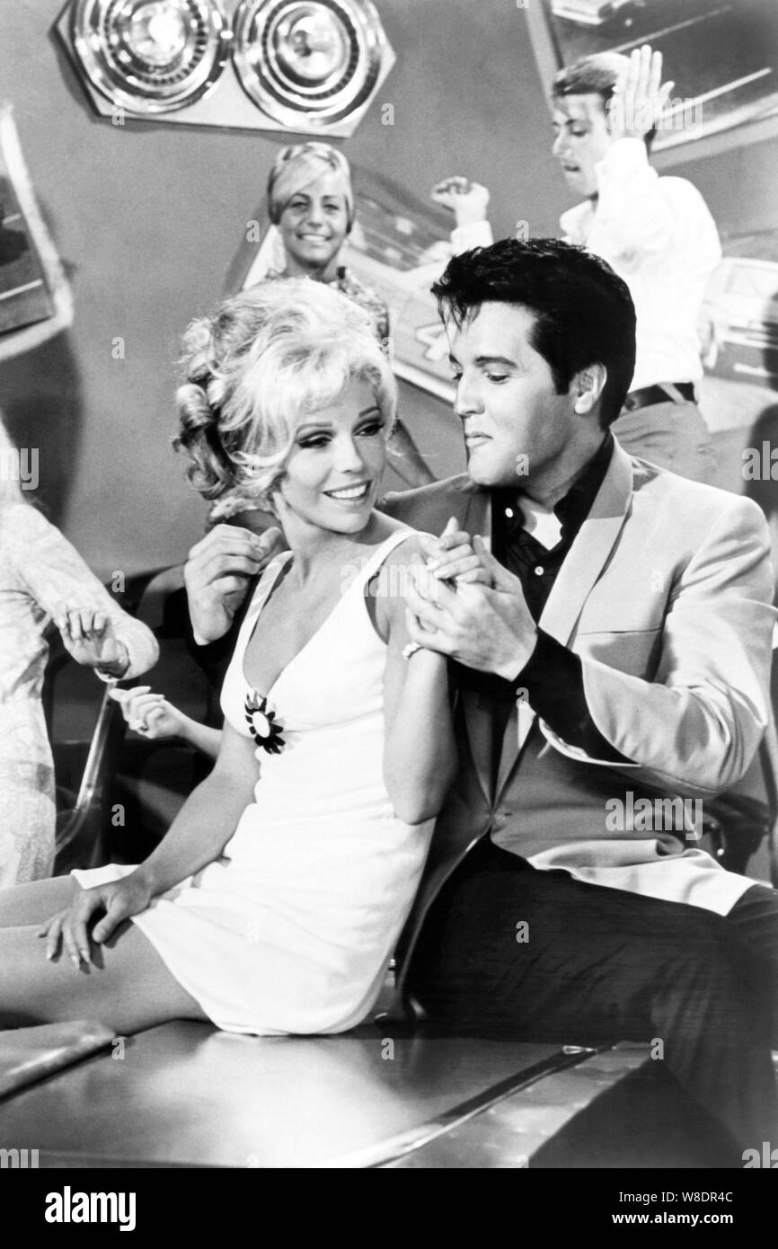 NANCY SINATRA and ELVIS PRESLEY in SPEEDWAY (1968), directed by NORMAN TAUROG. Credit: M.G.M. / Album Stock Photo