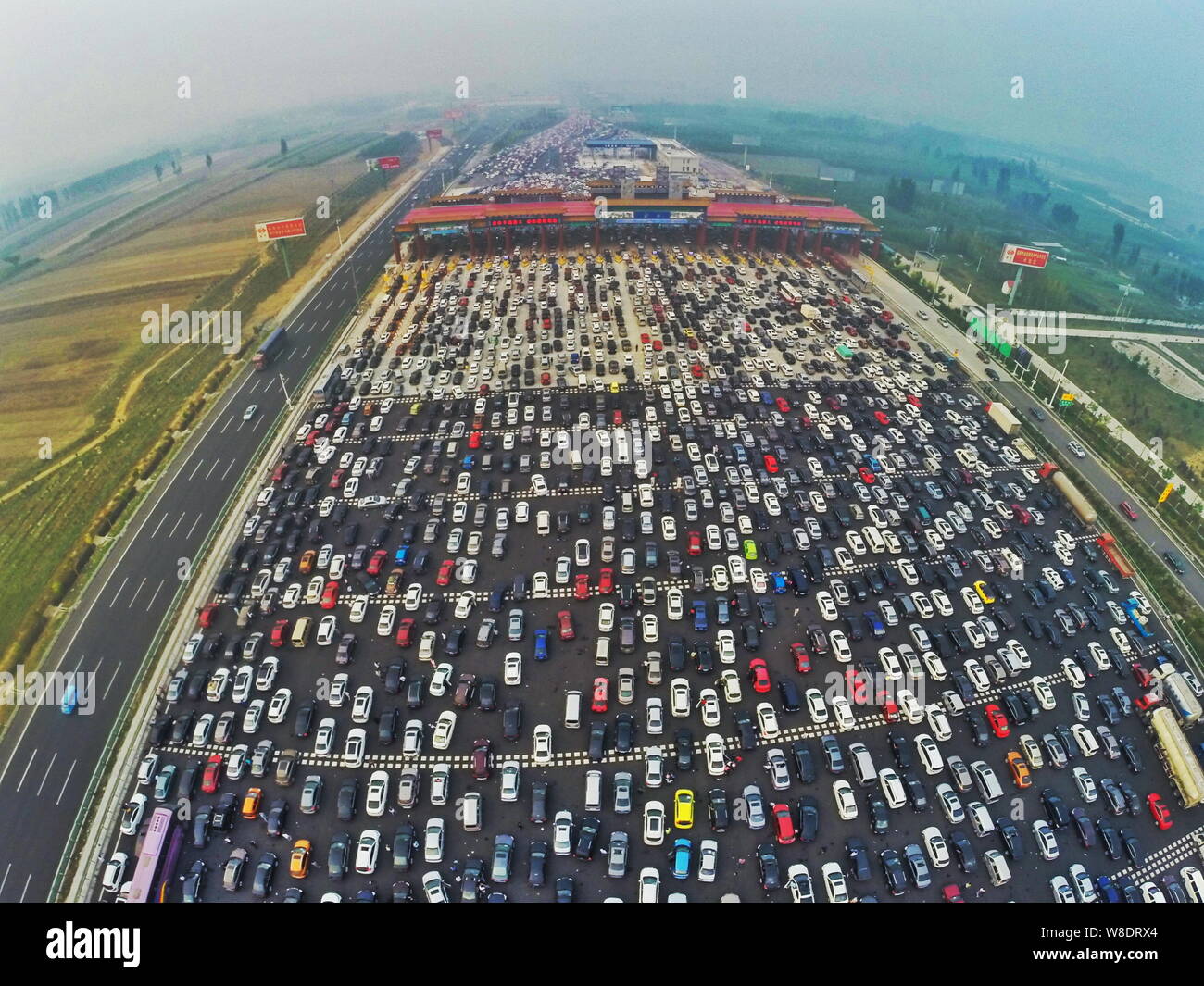 Aerial view of masses of cars travelling back to Beijing in a traffic jam on the Beijing-Hong Kong-Macao Expressway during the week-long National Day Stock Photo