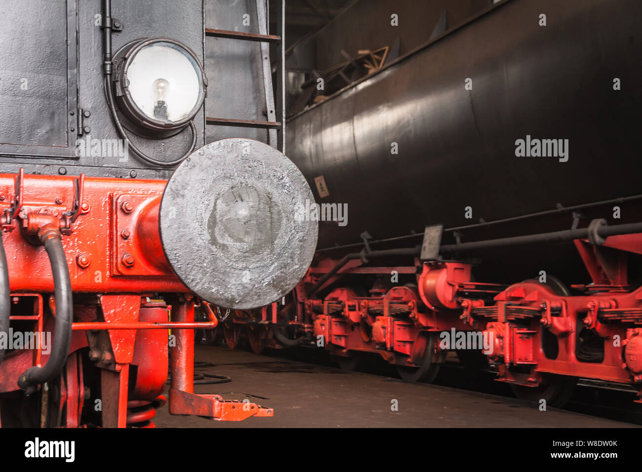 Old steam locomotives in a roundhouse in Germany Stock Photo