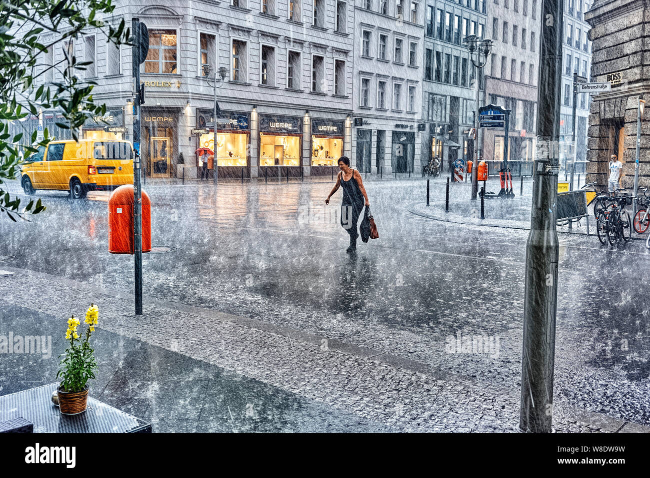 Berlin, Germany, 20-07-2019: rain splashing down in the streets of