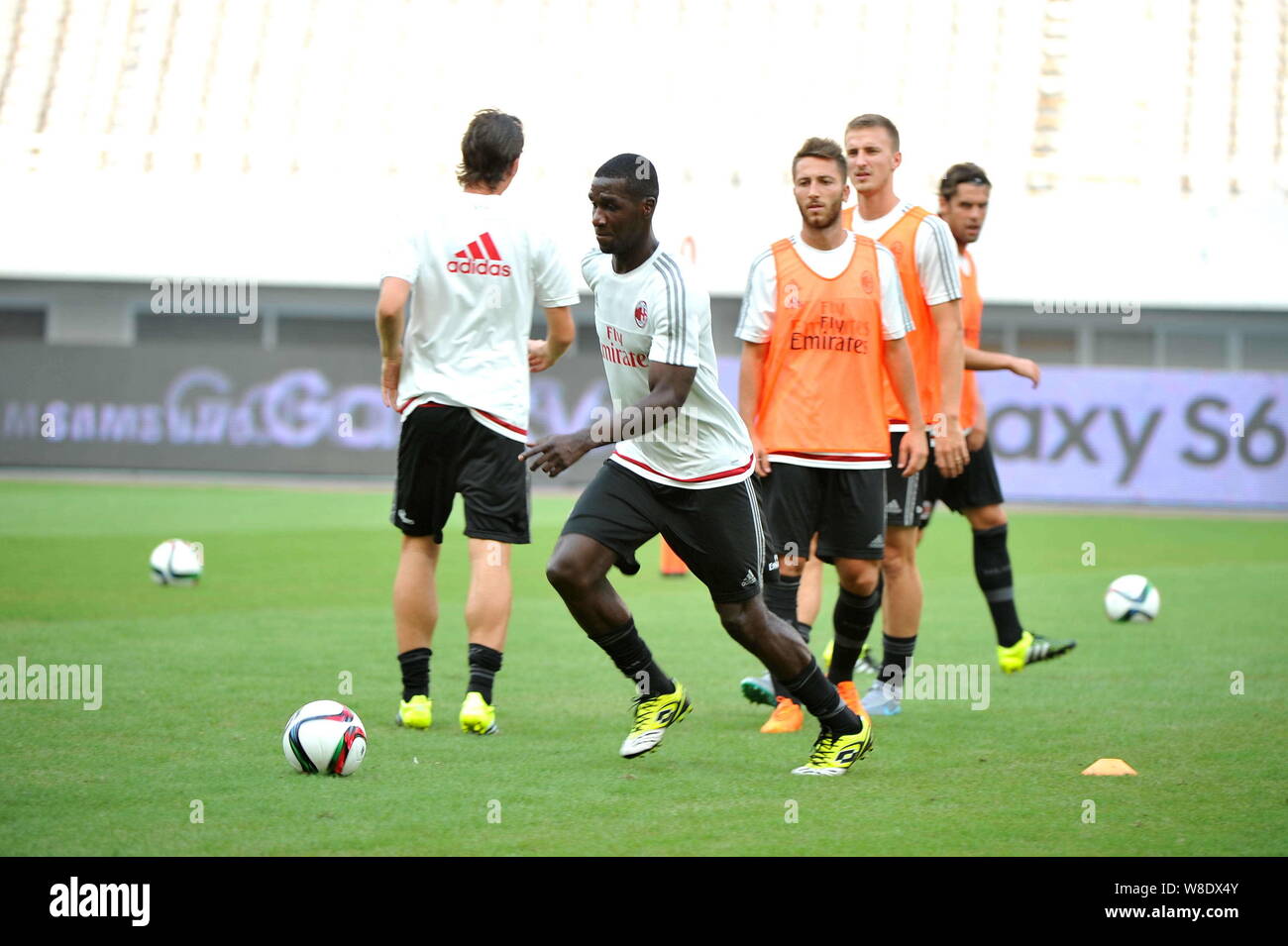 Cristian Eduardo Zapata Valencia, front, and teammates of AC Milan take part in a training session in Shanghai, China, 29 July 2015. Stock Photo