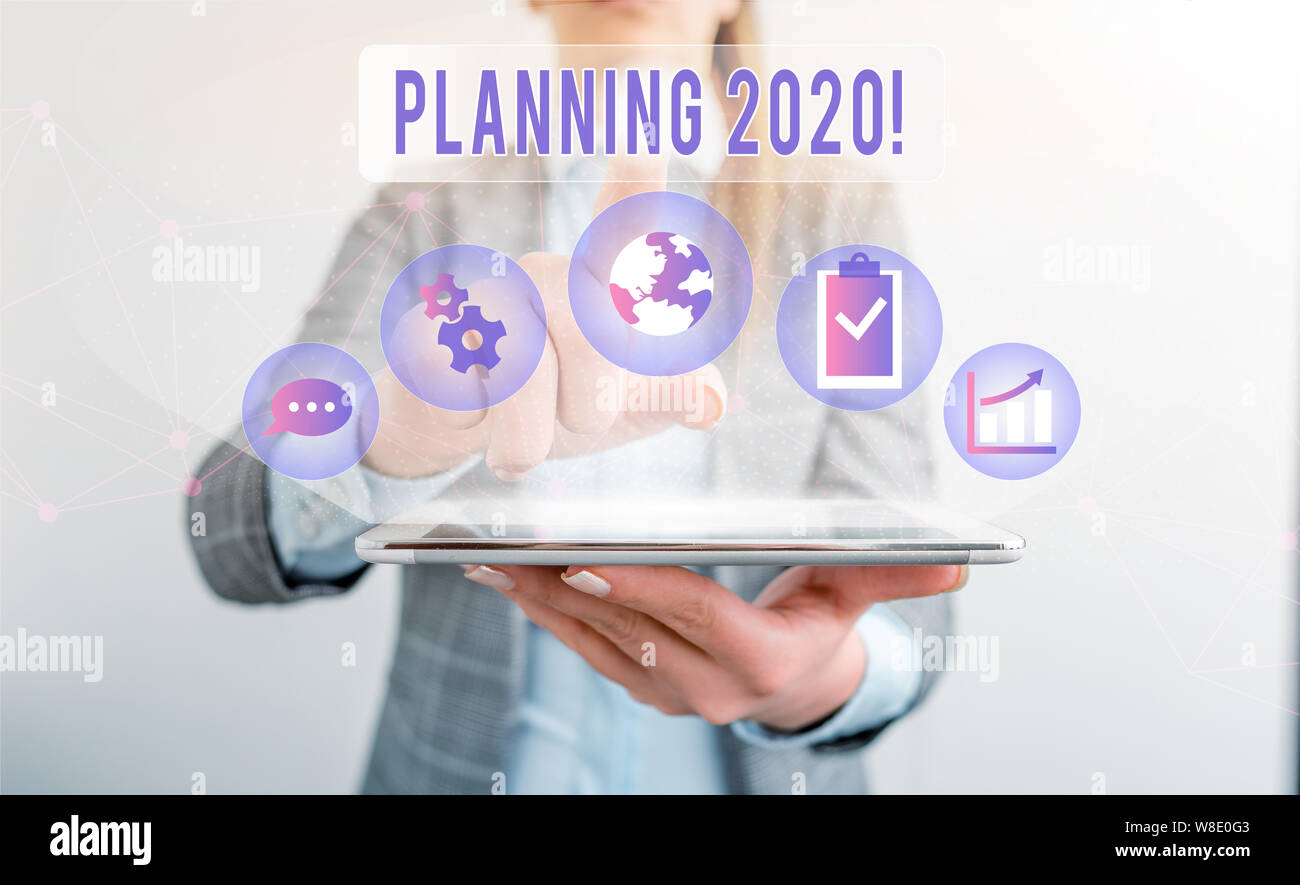 Writing note showing Planning 2020. Business concept for process of ...
