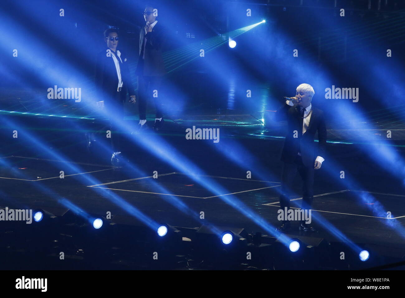 Members of South Korean boy group Bigbang or Big Bang perform at their concert in Macau, China, 24 October 2015. Stock Photo