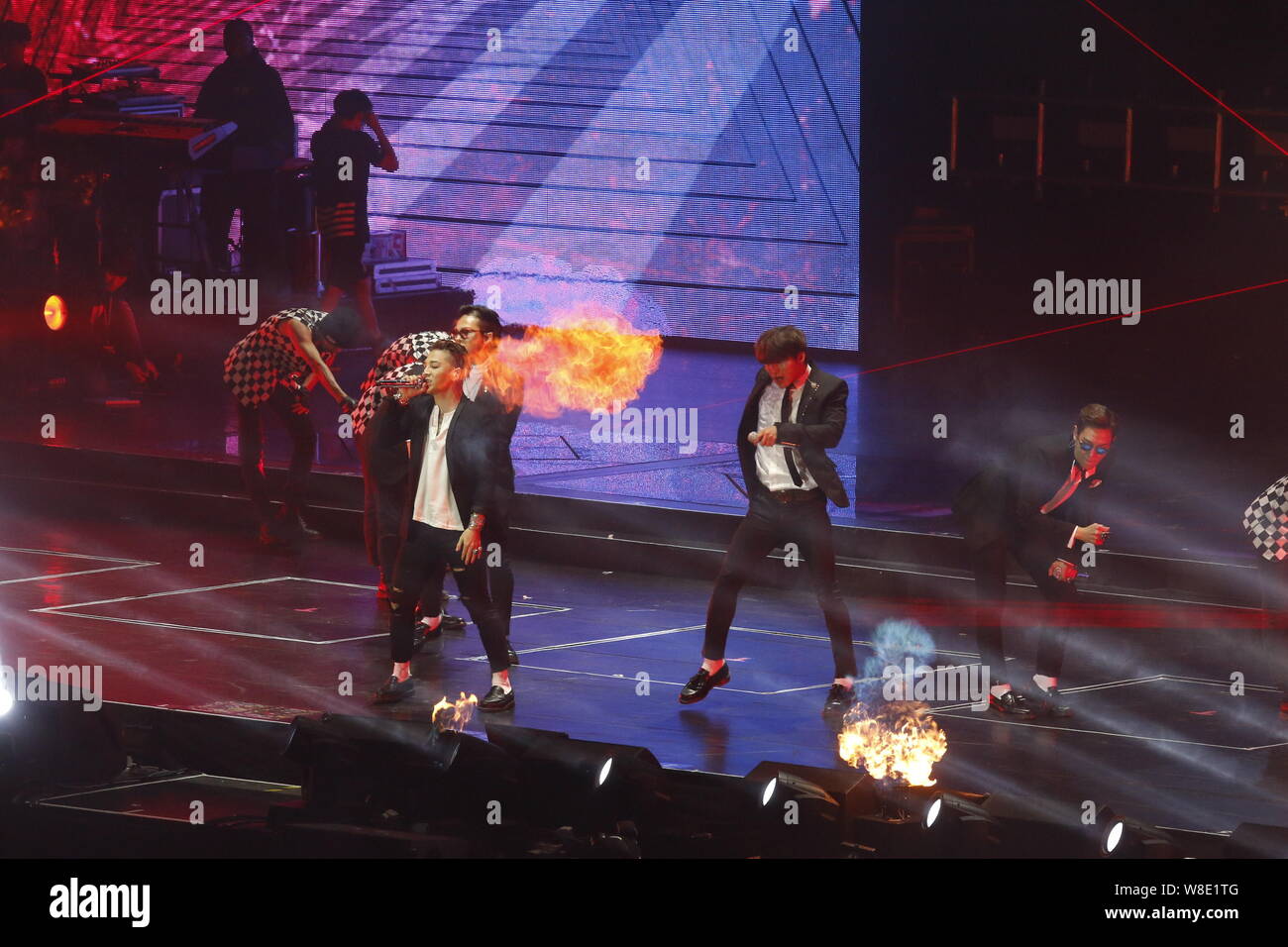 Members of South Korean boy group Bigbang or Big Bang perform at their concert in Macau, China, 24 October 2015. Stock Photo