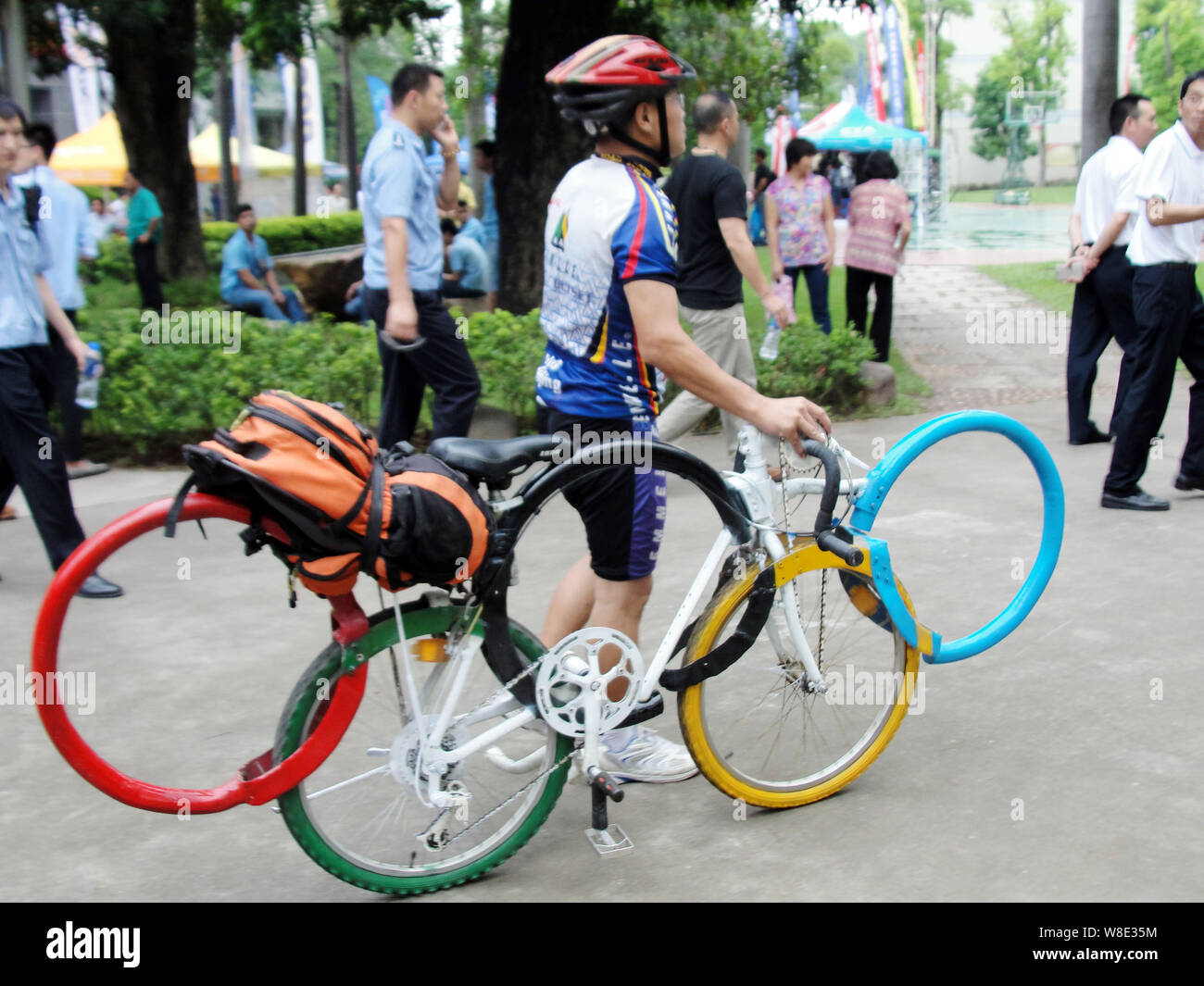Beijing resident Meng Jie front pushes his refitted bicycle