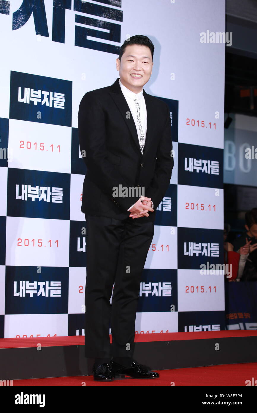 South Korean singer Park Jae-sang, better known by his stage name PSY, poses as he arrives for a VIP screening event of the new movie 'Inside Men' in Stock Photo