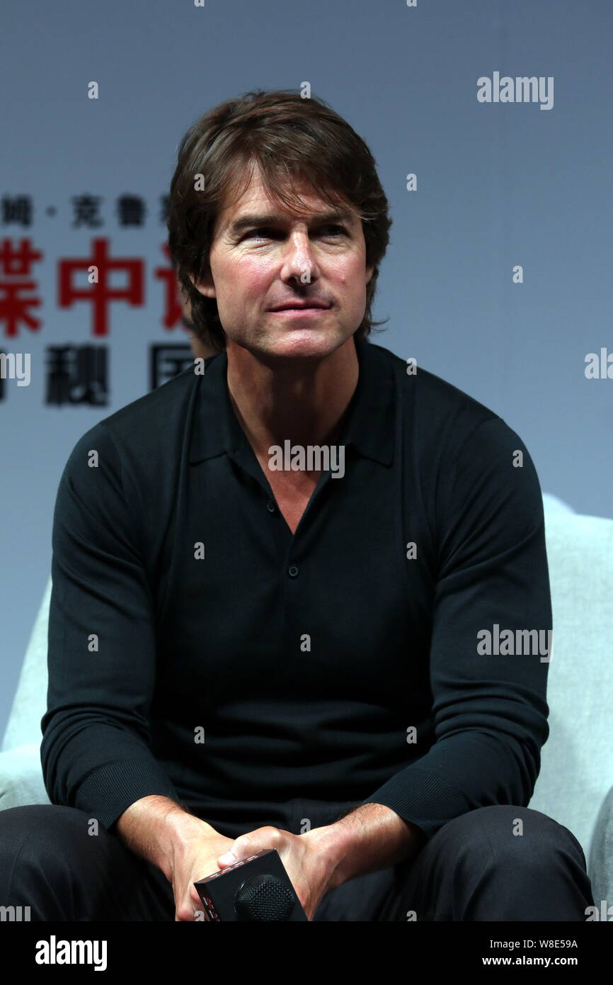 American actor Tom Cruise listens at a premiere event for his new movie 'Mission: Impossible ¨C Rogue Nation' in Shanghai, China, 6 September 2015. Stock Photo