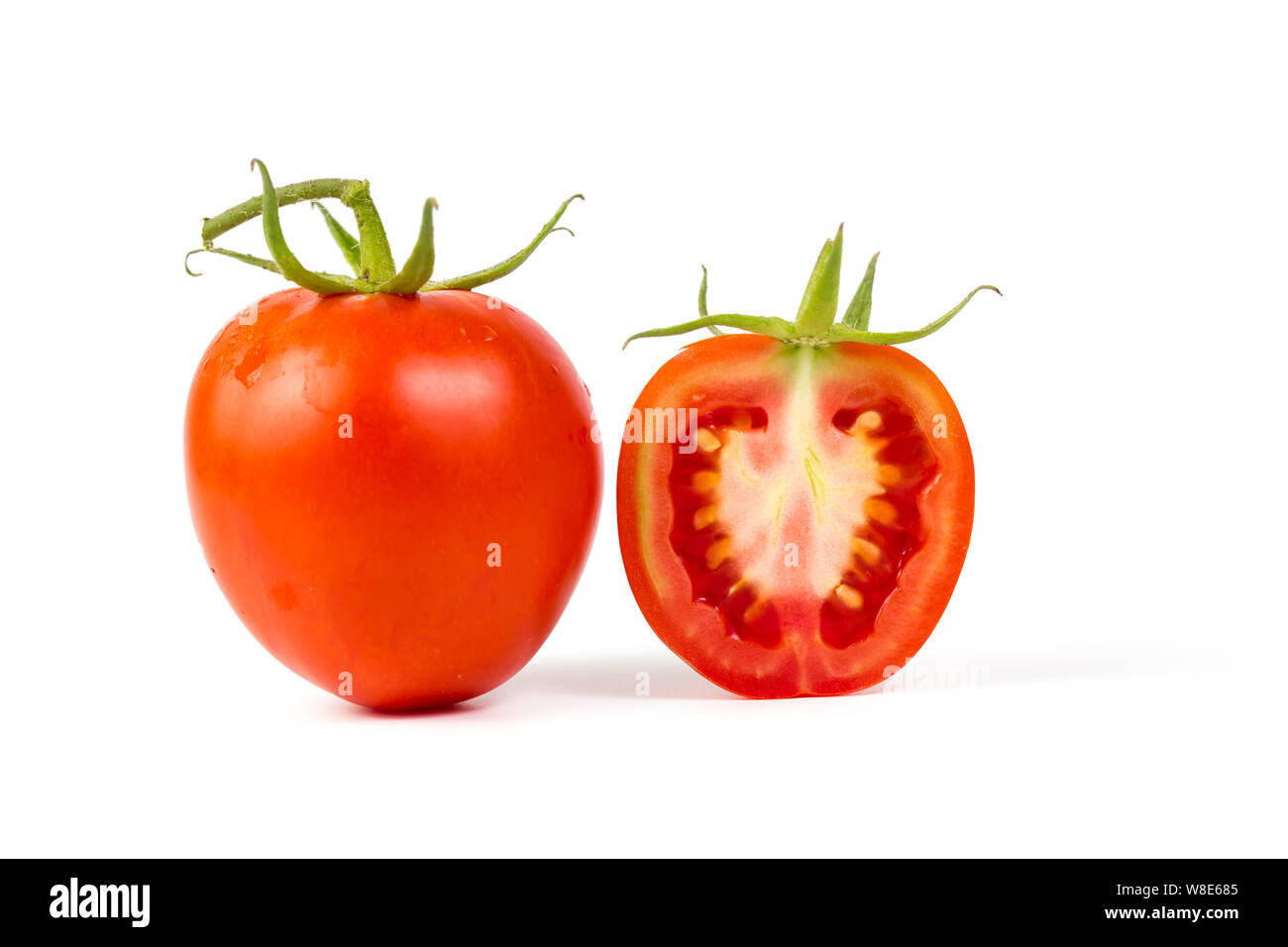 fresh tomato on white background Stock Photo - Alamy