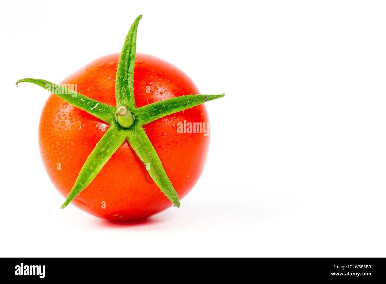 fresh tomato on white background Stock Photo - Alamy