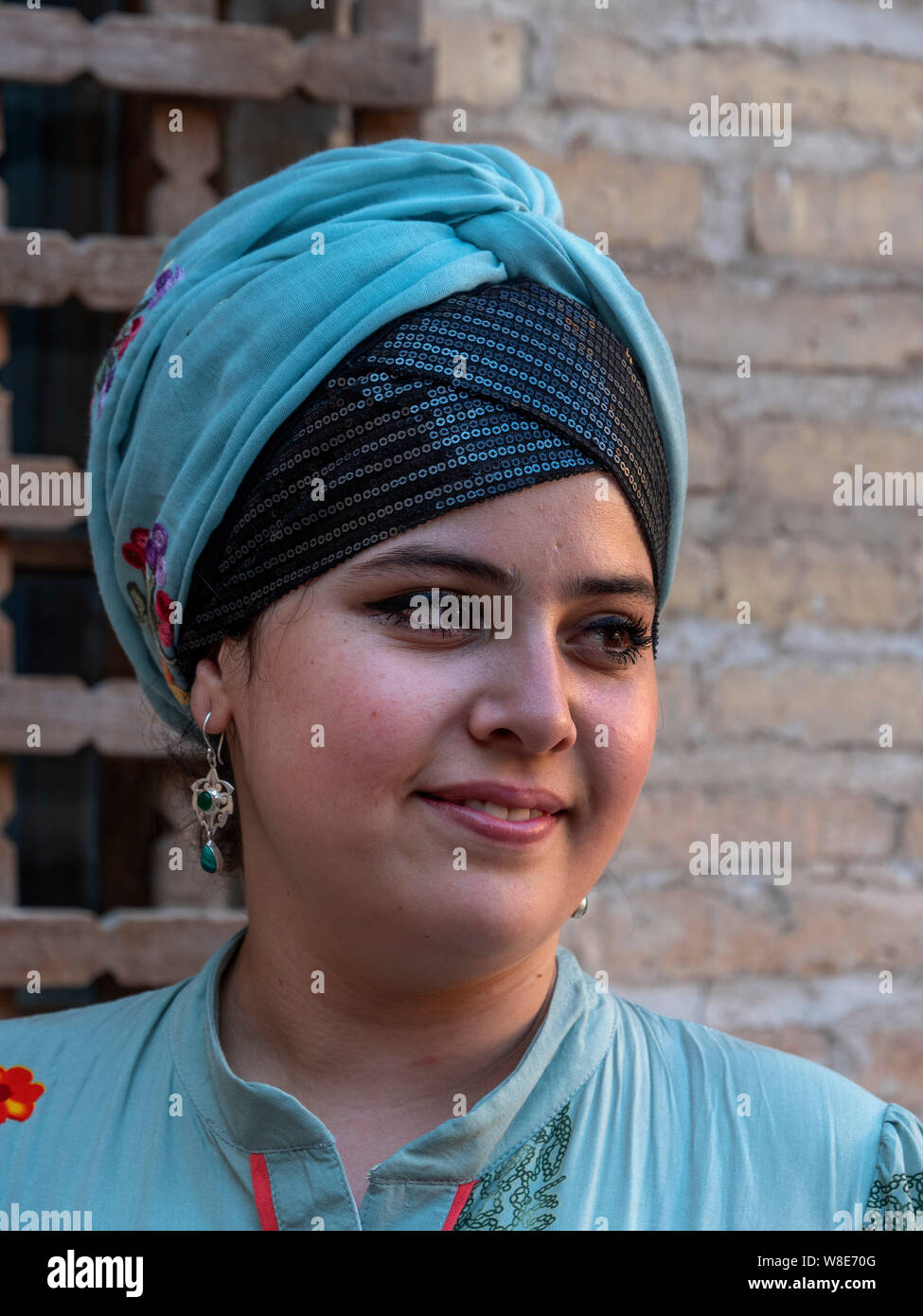 young woman in historic city Ichan Qala, Chiwa, Uzbekistan, Asia Stock Photo