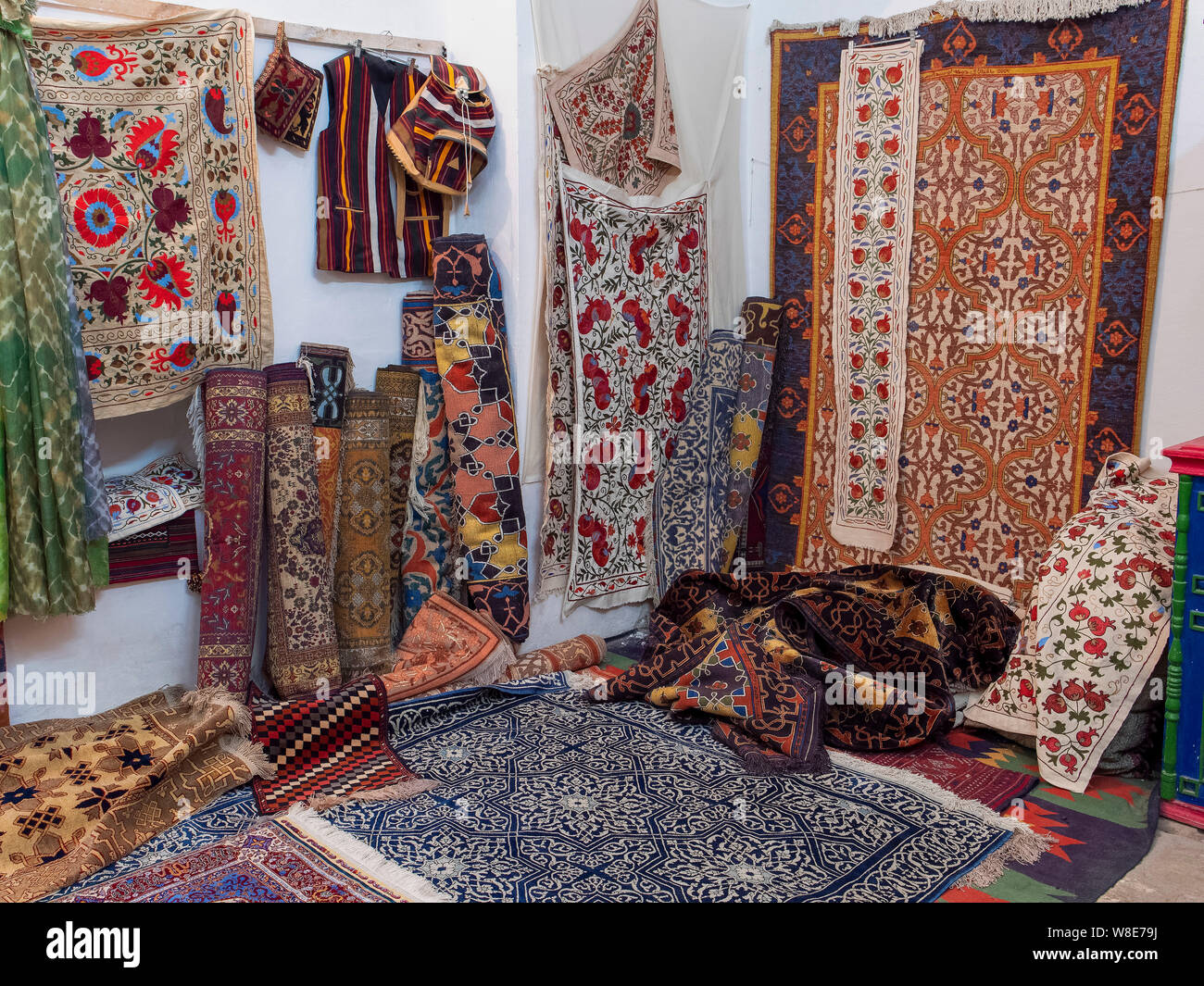 carpet dealer in historic city Ichan Qala, Chiwa, Uzbekistan, Asia Stock Photo