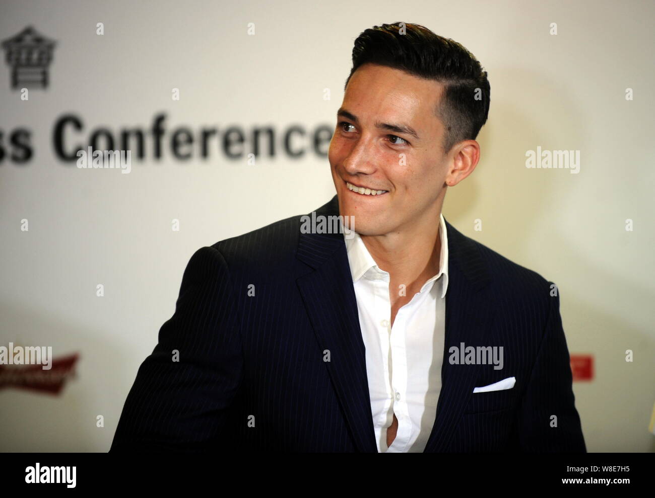 German gymnast Marcel Nguyen smiles during a press conference for the 2015 Porsche Carrera Cup Asia season in Hong Kong, China, 1 April 2015. Stock Photo