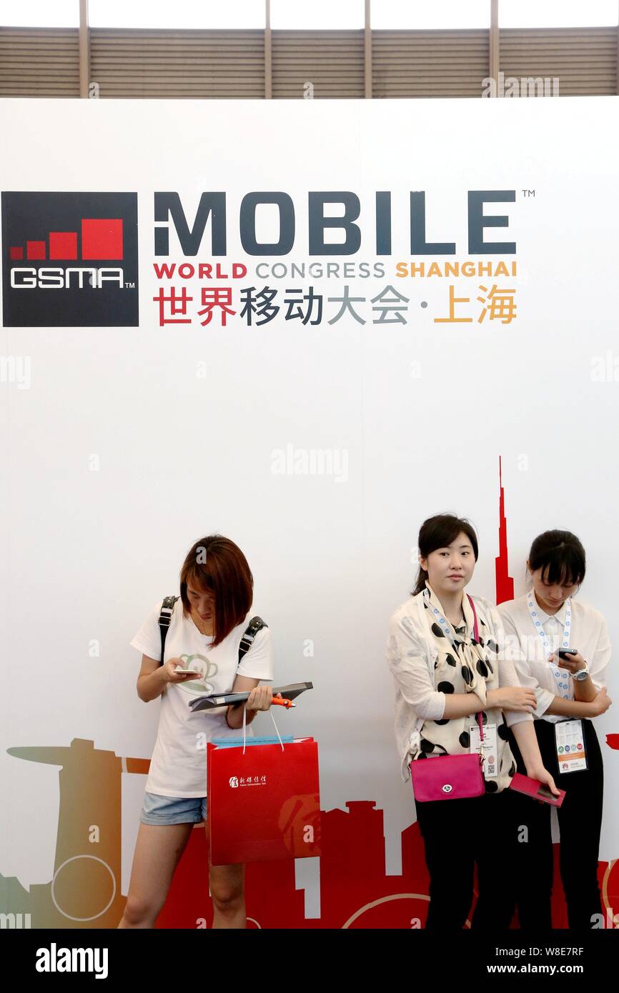 Visitors rest during the GSMA Mobile World Congress 2015 in Shanghai, China, 15 July 2015. Stock Photo