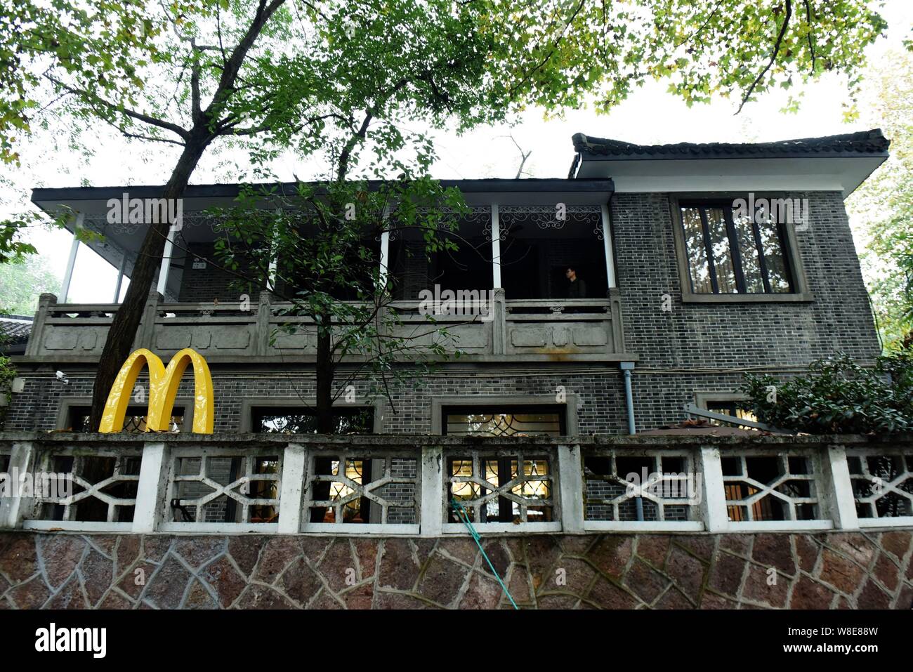 View of a fastfood restaurant of McDonald's, which was the former Kuomintang leader Chiang Ching-kuo's former residence, in Hangzhou city, east China' Stock Photo