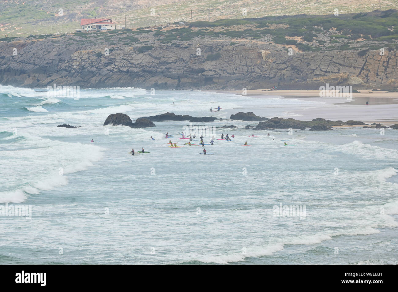 Praia do Guincho in Cascais, Portugal and surfers Stock Photo Alamy