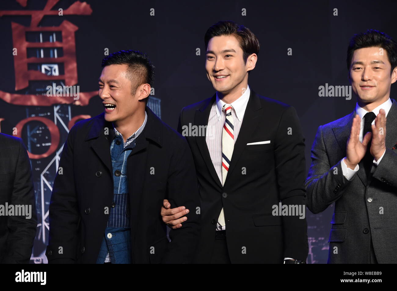 (From left) Hong Kong actor Shawn Yue, South Korean actors Choi Siwon and Ji Jin-hee attend a press conference for their new movie 'Helios' in Beijing Stock Photo
