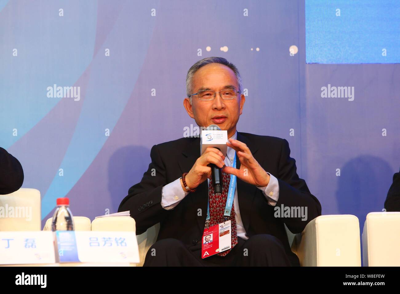 Lu Fangming, Chairman of Asia Pacific Telecom and Vice Chairman of Hon Hai Precision, speaks at a forum during the 2nd World Internet Conference, also Stock Photo