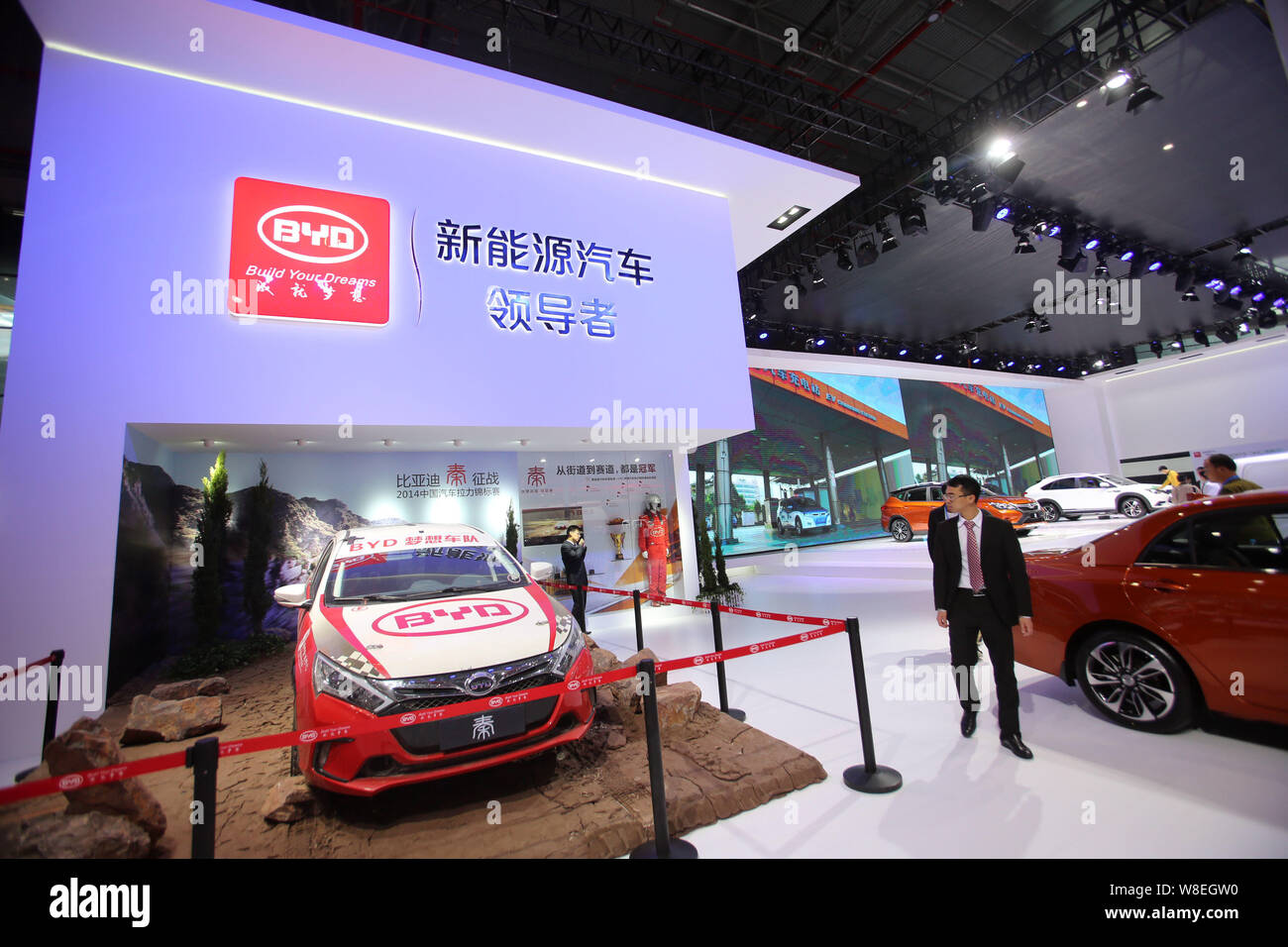 --FILE--People visit the stand of BYD during the 16th Shanghai ...