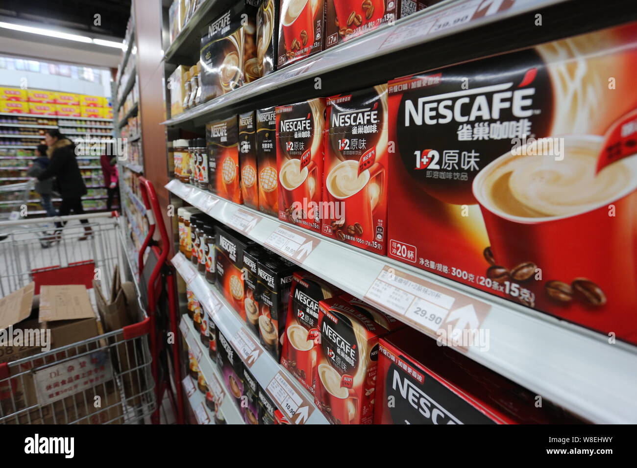 https://c8.alamy.com/comp/W8EHWY/file-cartons-of-nescafe-instant-coffee-of-nestle-are-for-sale-at-a-supermarket-in-xuchang-city-central-chinas-henan-province-7-december-2014-W8EHWY.jpg