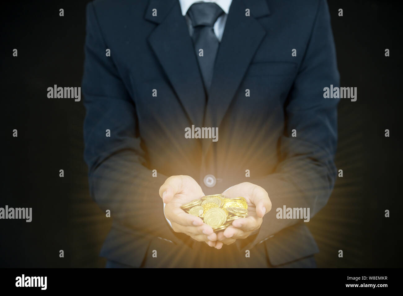 Businessman holding gold bar hi-res stock photography and images - Alamy