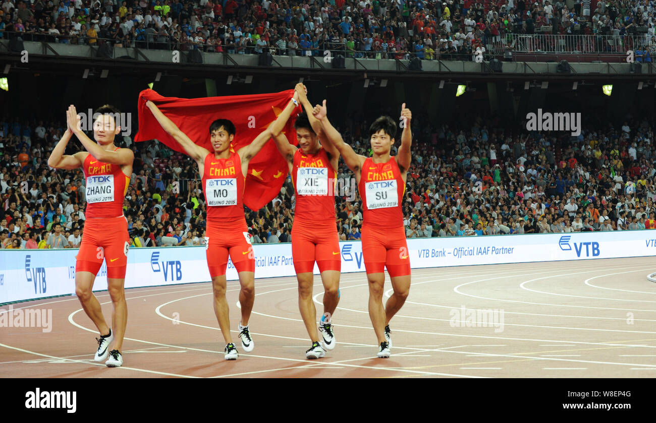 (From left) Zhang Peimeng, Mo Youxue, Xie Zhenye and Su Bingtian of China's men's 4x100m relay team celebrate after winning the runner-up of the men's Stock Photo