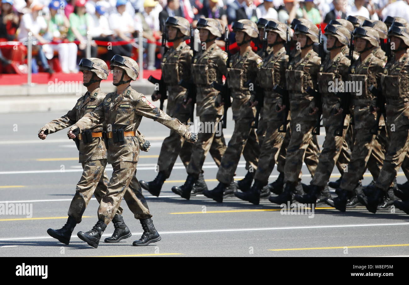 Chinese PLA (People's Liberation Army) soldiers march past the ...