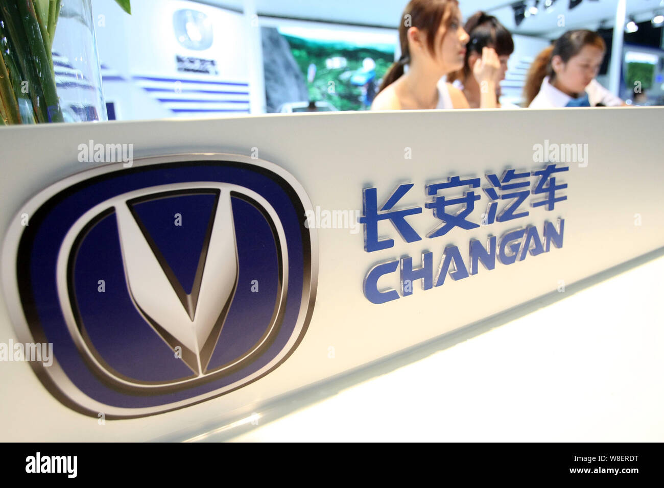 FILEChinese employees sit at the stand of Changan Automobile during