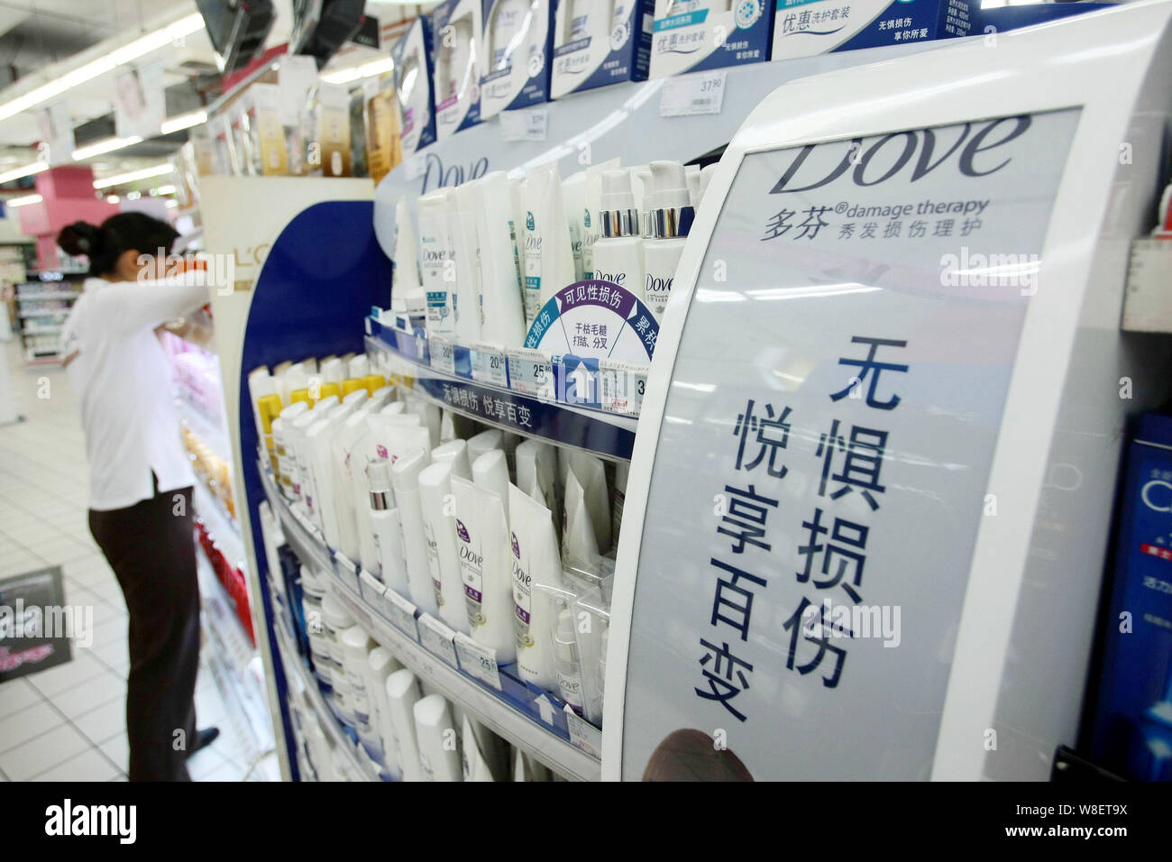 FILEBottles of Dove shampoo of Unilever are for sale at a