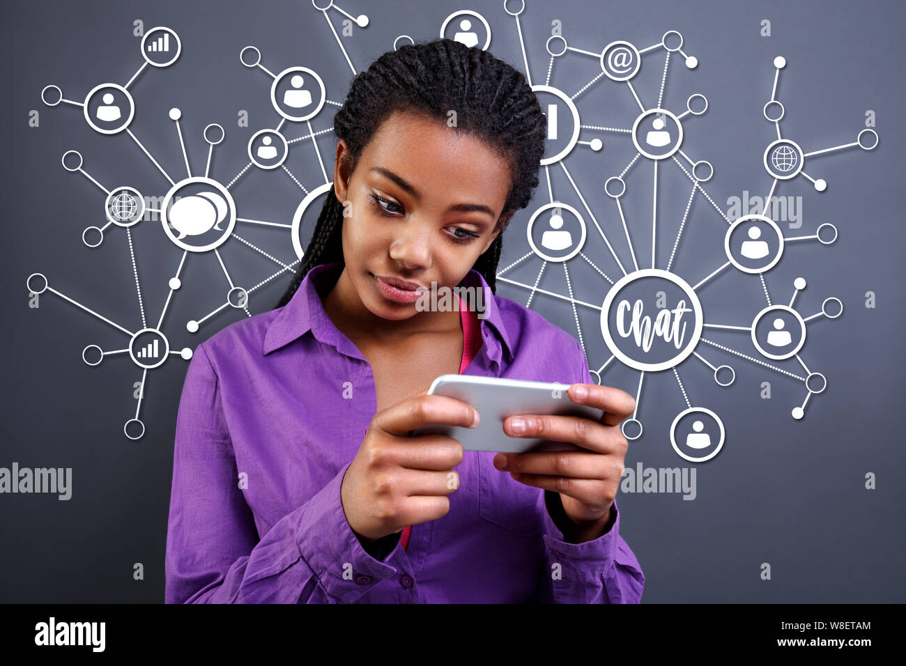 Afro-American girl chatting on cell phone Stock Photo