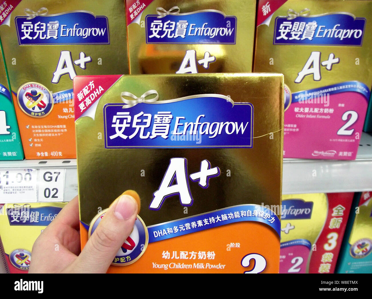 FILEA Chinese customer shops for a carton of Enfagrow milk powder