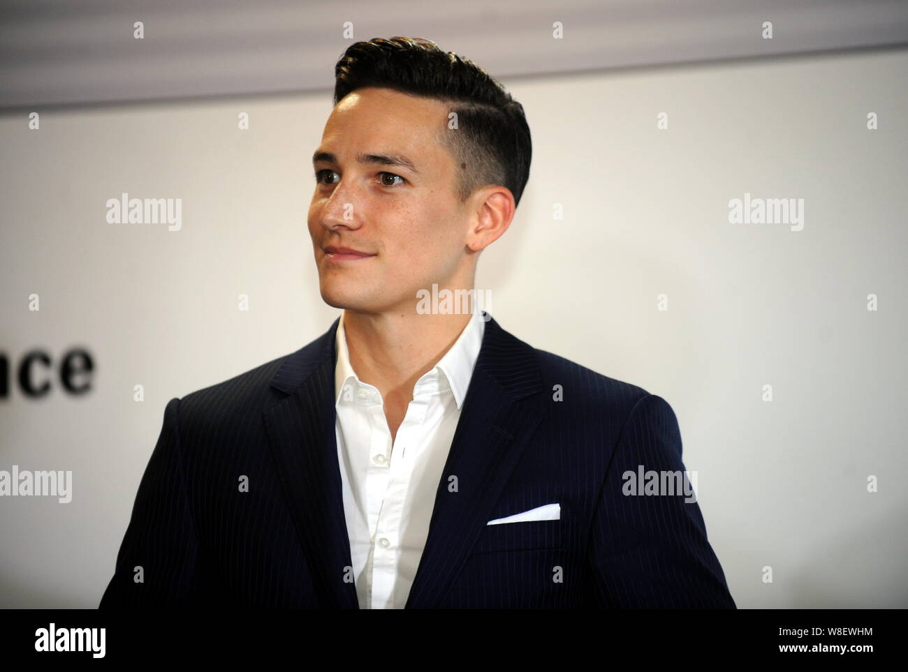 German gymnast Marcel Nguyen poses during a press conference for the 2015 Porsche Carrera Cup Asia season in Hong Kong, China, 1 April 2015. Stock Photo