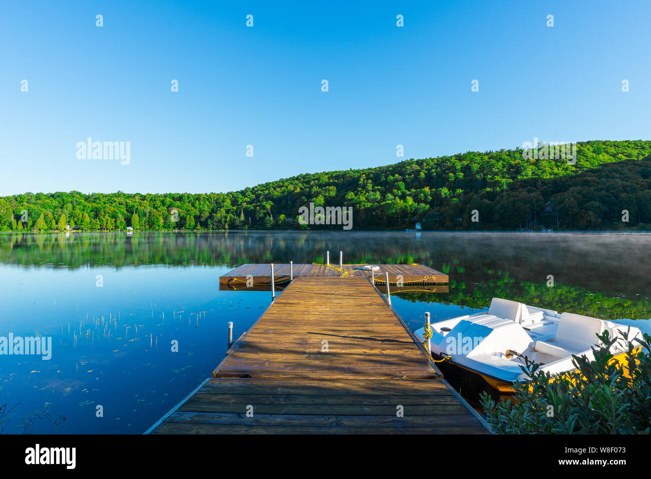 dock overlooking the quiet lake in the morning-2 Stock Photo